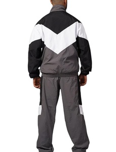 ชุดกันลมมีซิปสำหรับผู้ชายชุดกันลมผ้าไนลอนกันลมสำหรับใส่วิ่งกลางแจ้งกางเกงวิ่งออกกำลังกายระบายอากาศได้ดีบล็อกสีสะท้อนแสง - Product Image 2