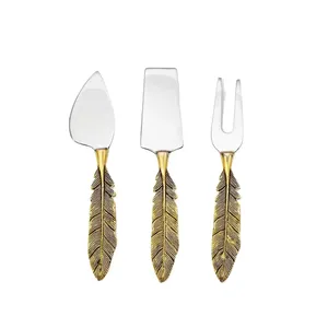 Juego de cuchillos para queso y mantequilla con diseño de hoja dorada en acero inoxidable con acabado elegante, perfecto para utensilios de cocina y servir frutas - Product Image 1