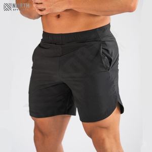 Shorts de sport pour hommes grande taille avec logo personnalisé, motif uni, style décontracté pour l'entraînement, vente en gros, écologiques, avec poches - Product Image 6