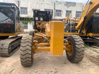 Niveleuse Caterpillar 140K avec moteur Cat C7.1 ACERT, vitesse de marche avant de 45 km/h, poids de 16 500 kg, niveleuse moyenne