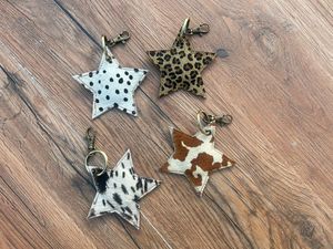 Nouveau Style Unique porte-clés en cuir de vachette porte-clés en cuir de vachette porte-clés élégant vente chaude porte-clés en fourrure véritable - Product Image 2