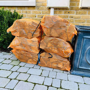 Leña dividida secada en horno, leña secada en horno en bolsas Madera de roble 18-26 Troncos 25 cm Ancho 53 cm Altura 38 cm Profundidad - Product Image 3