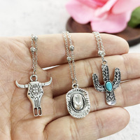 Ensemble de 3 colliers pendentifs de style western turquoise, bijoux bohèmes pour femmes et hommes, alliage de zinc avec motif de tête de taureau western, bottes tendance