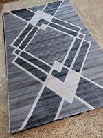 Tapis rectangulaire moderne Adiva en polypropylène sculpté, résistant aux taches, à poils moyens, pour salon, fabriqué à la machine, avec envers en jute