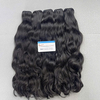Top couleur jetblack extension de cheveux humains vietnamiens texture ondulée naturelle prête à expédier cheveux trame machine