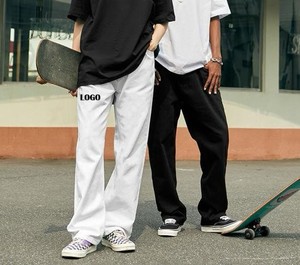 Jeans en denim bleu baggy personnalisé pour hommes de haute qualité lâche droite Hip Hop Streetwear pantalon bouton décoration respirant printemps - Product Image 1