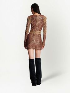 Elégante robe courte coupe cintrée pour femmes avec manches longues perlées paillettes brodées décorations de perles pour tenue de club - Product Image 4