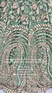 Vêtements de soirée de créateur Vêtements de mariage Filet lourd exclusif avec broderie à motif fantaisie Lehenga Choli à vendre - Product Image 3