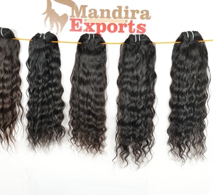 Vente en gros d'extensions de cheveux humains 100% naturels bruts vierges de haute qualité noirs ondulés indiens à cuticules alignées - Product Image 1