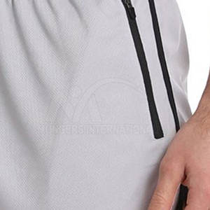 กางเกงขาสั้นสำหรับวิ่งสไตล์สตรีทปรับแต่งได้สำหรับผู้ชายผ้าฝ้ายเอวกลางเป็นมิตรกับสิ่งแวดล้อมลายทึบบริการ OEM - Product Image 6