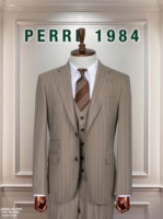 Costume d'affaires homme bleu marine à rayures fines, simple boutonnage, col à revers, coupe droite, en laine et polyester, infroissable, style britannique