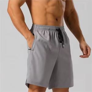 Fabricante directo de fábrica Pantalones cortos para hombres Clientes Diseño exigente y logotipo Bolsillo de secado rápido Pantalones cortos transpirables de alta calidad para hombres - Product Image 1