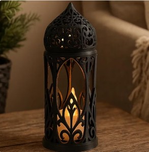 โคมไฟโมร็อกโกโลหะสีดำ ดีไซน์ฉลุลายหรูหรา ให้แสงเทียนอ่อนๆ เหมาะสำหรับตกแต่งบ้านในเทศกาลและเป็นของขวัญ - Product Image 1