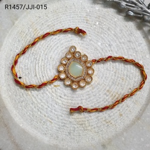Bracelet de mode Rakhi en pierre Kundan vert menthe pour frères Pack d'un - Product Image 1