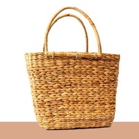 Nouvel arrivage Panier à fleurs tissé en paille écologique Jardinière d'herbe murale Panier à linge Panier à linge en rotin pour pique-nique