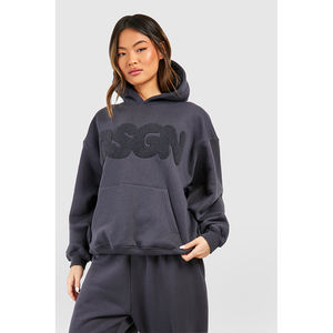 Femmes Dsgn Studio Bubble Towelling Applique Sweat à capuche surdimensionné Respirant Drop Shoulder Hoodies Fabriqué au Pakistan - Product Image 1