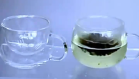 Vente en gros de tasses à thé en verre borosilicate Chien Keng, transparentes, minimalistes, avec infuseur, poignée, réutilisables, résistantes à la chaleur, 10-14 oz. Carton personnalisé