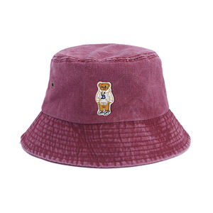 Embroidery <b>Bucket</b> Sun <b>Hats</b> Custom Washed-Effect Fisherman <b>Hat</b> With Teddy Bear Wearing A White Sweatshirt - Product Image 1