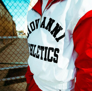 Conjunto de pantalones y chaqueta con cremallera y logotipo personalizado para hombre, chándal de poliéster y nailon de retazos, ropa deportiva para correr para invierno con técnicas de diamantes de imitación - Product Image 6