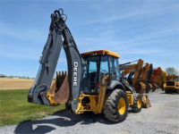 Chargeuse-pelleteuse Deere 410K d'occasion 2014, 4x4, capacité de charge nominale de 100 tonnes, moteur, fourches à attache rapide, cabine, chauffage, climatisation, offre limitée