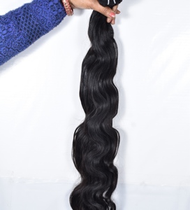 Venta al por mayor de extensiones de cabello ondulado natural vietnamita negro de las mujeres de materia prima de doble trama de la máquina de cutícula alineada paquete indio - Product Image 3