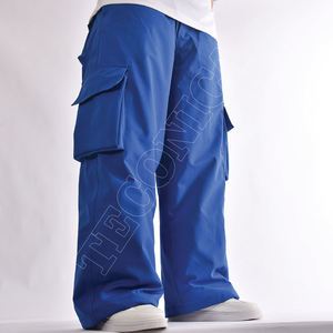 Pantalones de esquí de nieve de carga impermeables y a prueba de viento azul real unisex con múltiples bolsillos cintura ajustable y ajuste relajado - Product Image 1