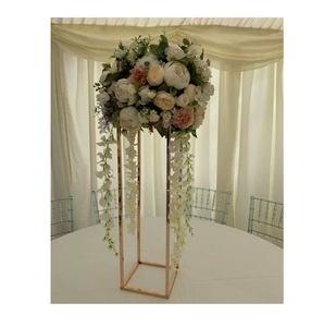 This sturdy metal mesh <b>planter</b> holds plants securely and adds a neat modern style suited for indoor garden corners - Product Image 1