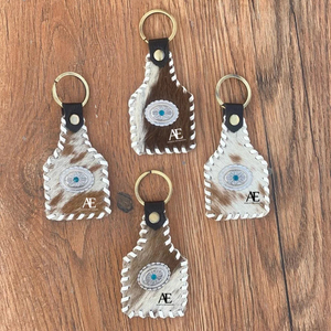 Nouvel arrivage de porte-clés stylisés en cuir cousus porte-clés Offre Spéciale en cuir véritable porte-clés de luxe en cuir de forme unique - Product Image 1