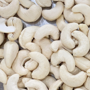 Fabricación de anacardos crudos WW240 WW320 WS LP Venta al por mayor Santigo Factory Vietnam Exportado Asia UE Oriente Medio - Product Image 1