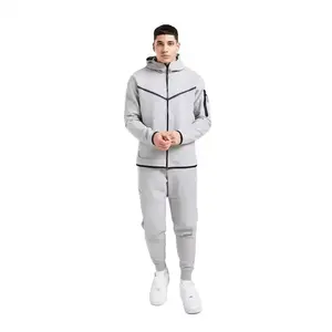 Pas encore d'avis Survêtement personnalisé pour hommes Ensemble sweat à capuche et pantalon de survêtement avec fermeture éclair complète Survêtement unisexe avec impression bouffante - Product Image 1