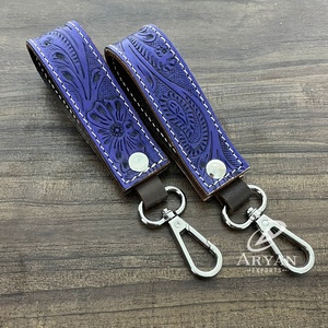 พวงกุญแจหนังวัวแท้พร้อมอุปกรณ์มือที่มีสไตล์ใหม่พวงกุญแจส่วนบุคคลทนทานและหนังวัวที่ใช้งานได้หลากหลาย - Product Image 1