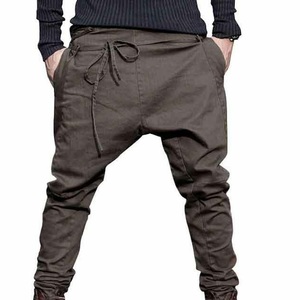 Pantalon de survêtement en polaire de polyester, taille élastique, respirant, boutons sur le devant, jambes larges, évasées, poches latérales à fermeture éclair, uni, style décontracté - Product Image 4