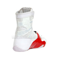 Chaussures de boxe à lacets avec semelle légère pour un jeu de pieds rapide Chaussures de boxe haute performance pour les sportifs amateurs et professionnels