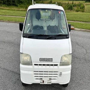 Camionnette SU ZU KII C-A-R-R-Y 4x4 d'occasion, année 2000, conduite à gauche, sièges en cuir - Product Image 1