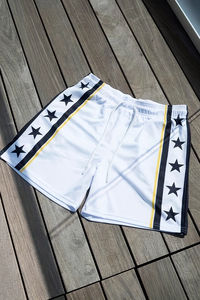 กางเกงขาสั้นผู้ชายลำลอง ปี 2025 กางเกงชายหาด กางเกงว่ายน้ำ กางเกงกีฬาลายดาวพิมพ์ลายทาง แห้งเร็ว ใส่ได้ทุกวัน เนื้อผ้านุ่ม - Product Image 4