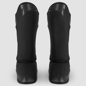 Precio al por mayor Muay Thai Kick Boxing Mma Boxeo Espinilleras Kick Pad Foot Protector Rod Pierna Protectores Espinilleras OEM - Product Image 5