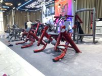 Machine commerciale d'extension des jambes assise, entraîneur de quadriceps, à charge libre, avec cadre en tube ovale plat en acier peint, pour entraînement du bas du corps en salle de sport