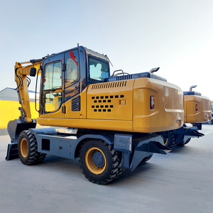 Excavatrice sur pneus, machine de construction routière robuste, cabine fermée haute visibilité - Product Image 1