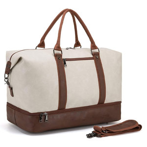 Bolsa de lona de estilo moderno con gran almacenamiento y múltiples opciones de transporte - Product Image 1