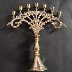 Solid brass 8-Batti <b>candle</b> stand with wide base and deep diya holders perfect for temple lighting during <b>prayers</b> - Product Image 2