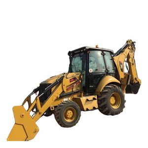 Chargeur rétrocaveuse 4x4 à vendre avec des pneus lourds, conçus pour les terrains accidentés et les travaux difficiles - Product Image 1