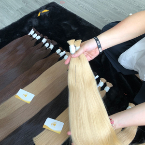 Minh Khang Hair Vietnam ofrece el mejor precio a granel 100% Extensiones de cabello humano virgen Remy ruso Materia prima de alta calidad Vietnam - Product Image 1