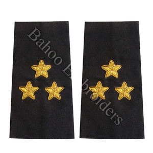 EPAULET CON TRES (3) ESTRELLAS, BORDADOS EN NEGRO CON DETALLES EN DORADO - Product Image 1