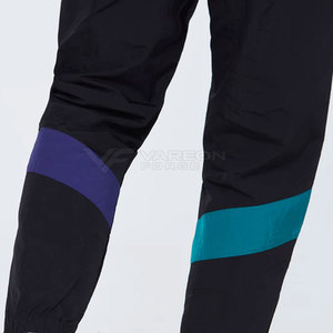 Ensemble coupe-vent pour homme de haute qualité avec veste et pantalon ajustable à cordon de serrage pour le sport ou un look streetwear - Product Image 4