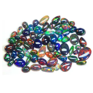 Véritable Opale Noire Ethiopienne Cabochon Mix Shape Glowing Rainbow Flashy Ethiopian Black Opal Gemstone au prix de gros - Product Image 1