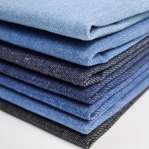 Wholesale Good Quality Stock Fabric Plain Weaving Yarn Dyed Technics Cotton Material Denim Stock Fabric jeans