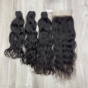 Venta al por mayor de extensiones de cabello humano vietnamita natural ondulado sin procesar mechones de cabello humano con cutícula completa alineada - Product Image 1