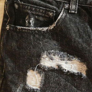 Shorts décontractés style urbain usé pour l'été, en tissu doux et respirant, avec un attrait moderne et tendance pour le quotidien. - Product Image 4