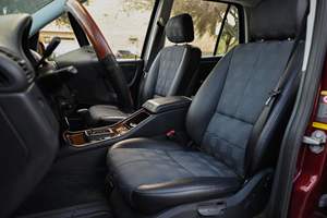 Mercedes-Benz ML320 d'occasion de 2002, sans réserve, 1 propriétaire, transmission intégrale, rouge bordeaux, provenance sud-est - Product Image 5