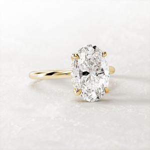 Bague solitaire élégante en forme d'ovale avec halo caché, or jaune massif, diamant de laboratoire certifié VVS, bijoux en gros pour elle - Product Image 1